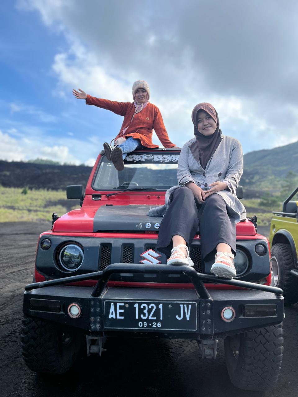 4x4 Jeep driving through volcanic ash and steam
